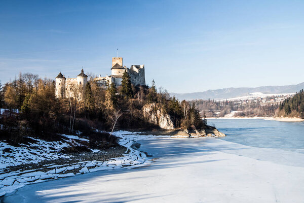 Dunajec castle in Niedzica, Poland, Czorsztyn lake at winter