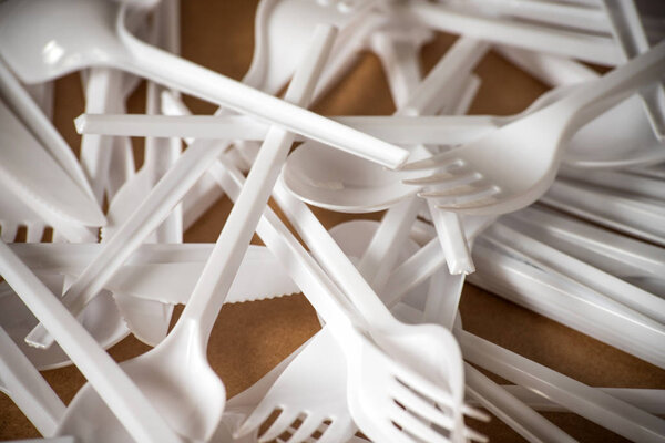 Plastic disposable cutlery, forbidden in European Union.