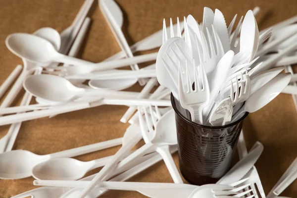 Plastic disposable cutlery, forbidden in European Union.