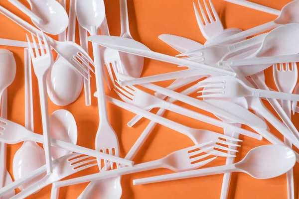 Plastic disposable cutlery, forbidden in European Union.