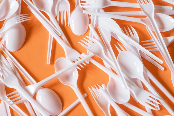 Plastic disposable cutlery, forbidden in European Union.
