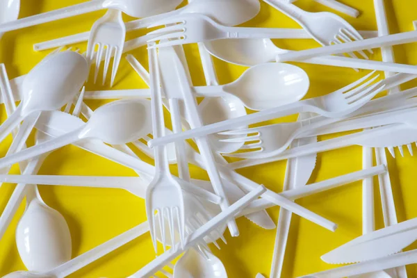 Plastic disposable cutlery, forbidden in European Union.