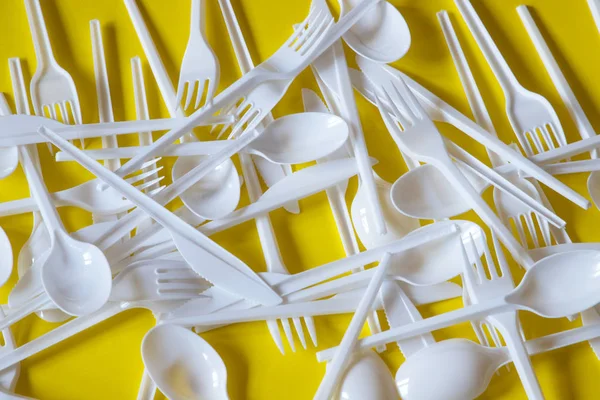 Plastic disposable cutlery, forbidden in European Union.