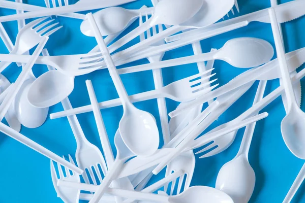 Plastic disposable cutlery, forbidden in European Union.