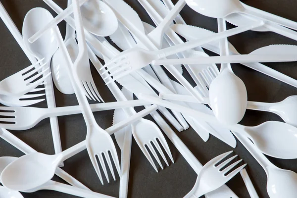 Plastic disposable cutlery, forbidden in European Union.