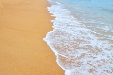 arka plan turuncu kum ve deniz suyu