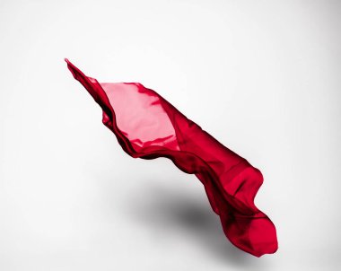 Soyut kırmızı kumaş parçası uçan, yüksek hızlı stüdyo çekimi