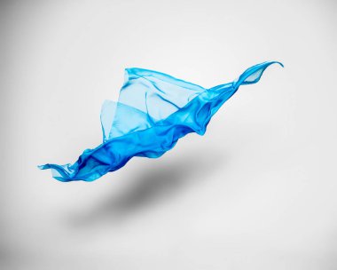 soyut mavi kumaş parçası uçan, yüksek hızlı stüdyo çekimi