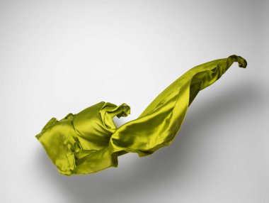 Soyut yeşil kumaş parçası uçan, yüksek hızlı stüdyo çekimi