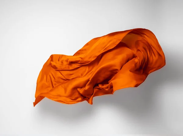 高速スタジオ撮影オレンジ生地の抽象的な部分 — ストック写真