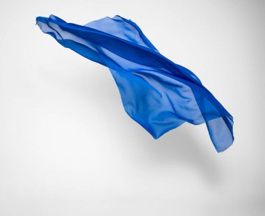 soyut mavi kumaş parçası uçan, yüksek hızlı stüdyo çekimi