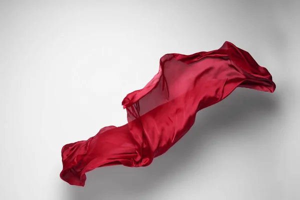 Pedaço Abstrato Tecido Vermelho Voando Tiro Estúdio Alta Velocidade — Fotografia de Stock