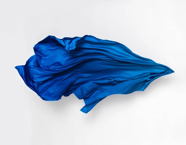 抽象的な青の生地の飛行 高速スタジオのショット — ストック写真