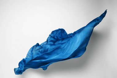 soyut mavi kumaş parçası uçan, yüksek hızlı stüdyo çekimi