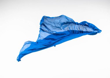 soyut mavi kumaş parçası uçan, yüksek hızlı stüdyo çekimi