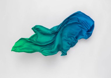 Soyut bir parça gök mavisi uçan, yüksek hızlı stüdyo çekimi