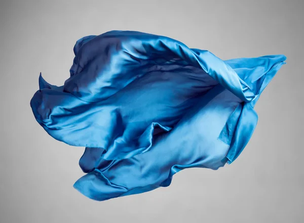 Abstrak kain biru dalam gerak — Stok Foto