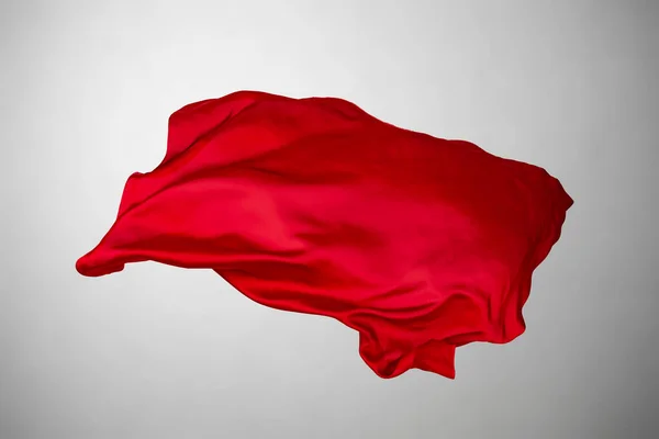 Abstract red fabric in motion — Stock Photo, Image