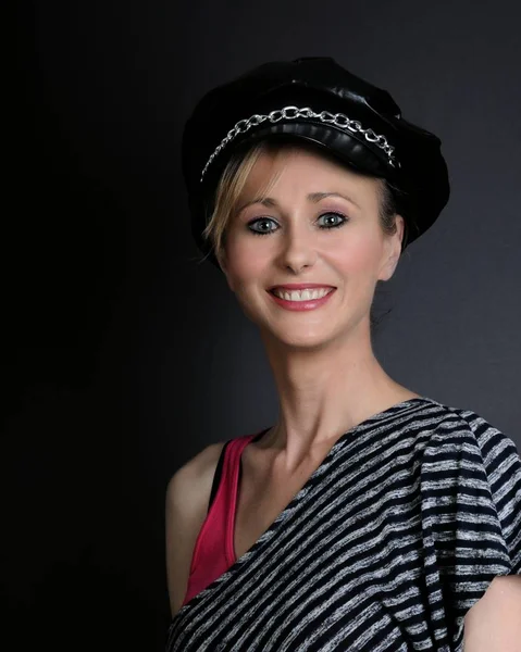 Pretty blond in motorcycle hat — Stock Photo, Image