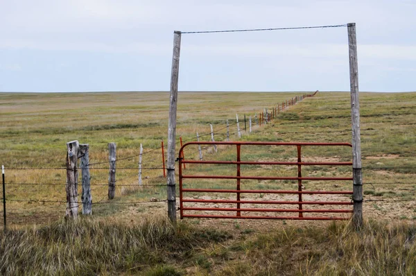 Gated fence to enclose horses in Colorado, USA. — Stock Photo, Image