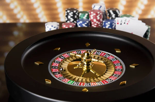 Poker Chips on gaming table, roulette