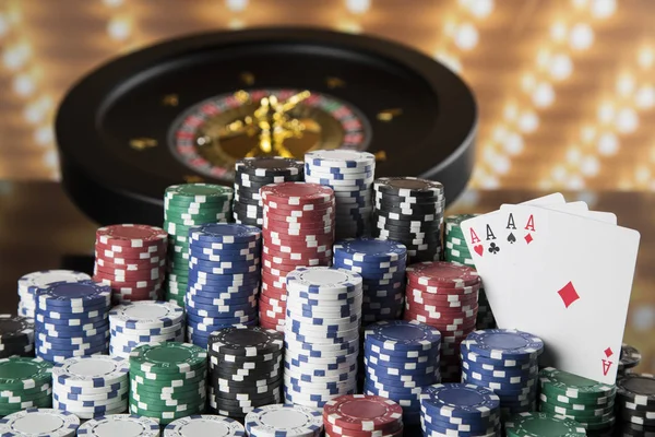 Poker Chips on gaming table, roulette