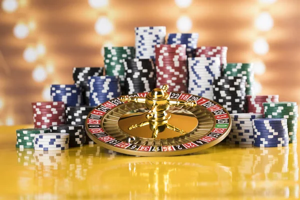 Poker Chips on gaming table, roulette