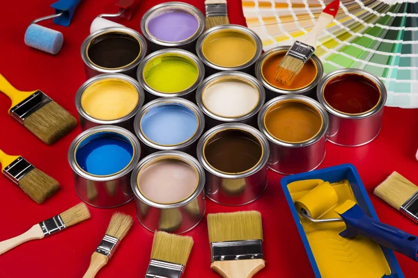 Collection Colored Paints Cans Brush Red Background — Stock Photo, Image