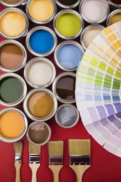 Collection Colored Paints Cans Brush Red Background — Stock Photo, Image
