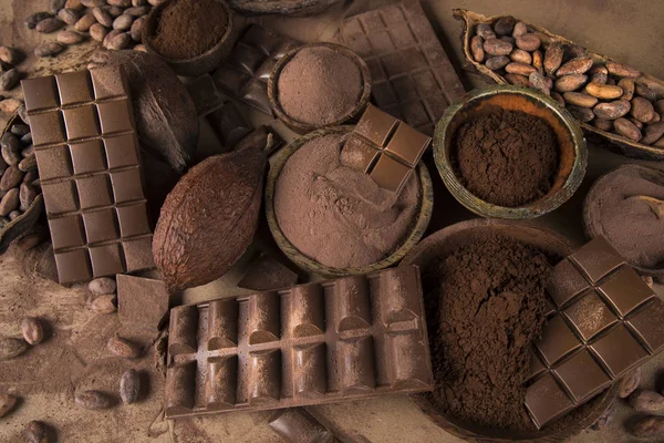 Leche Chocolate Negro Sobre Fondo Papel Natural —  Fotos de Stock