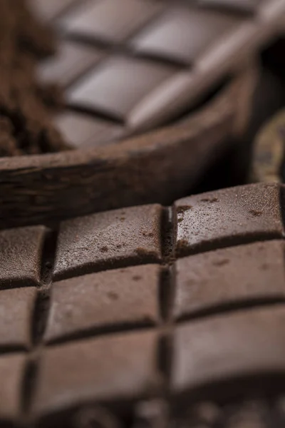 Chocolate, dulces dulces, alimentos de postre en el fondo de papel natural — Foto de Stock