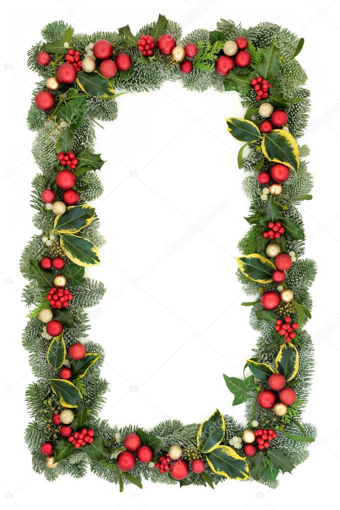 Christmas  background border with red and gold bauble decorations, holly, fir, mistletoe and ivy isolated on white background. Festive theme.