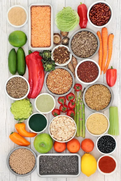 Liver detox diet health food concept with fruit, vegetables, herbal medicine, legumes, seeds, grains, cereals and supplement powders. High in antioxidants, omega 3, vitamins &  dietary fibre. Top view.