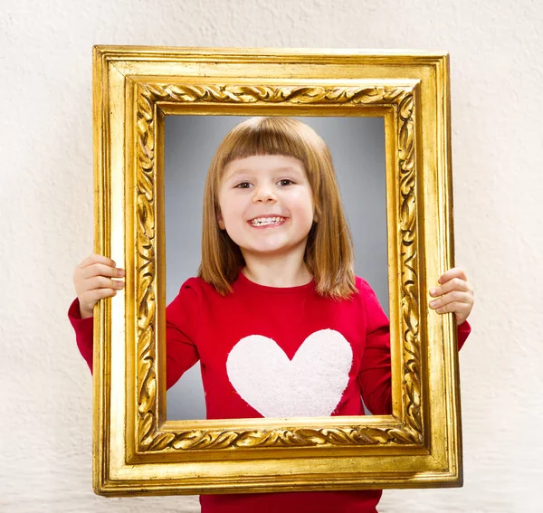 Smiling Girl Looking Vintage Picture Frame — Stock Photo, Image