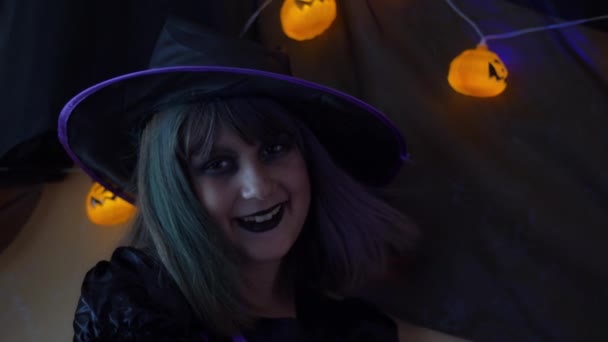 Young Little Girl Dressed Witch Surrounded Bright Pumpkins Celebrates Halloween — Stock Video