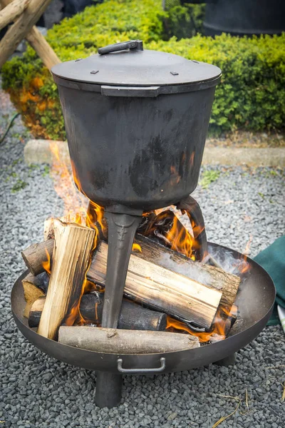 Hot cauldron over the fire — Stock Photo, Image