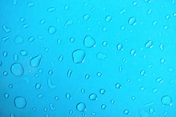 Vízcseppek Kék Üveg Háttér — Stock Fotó