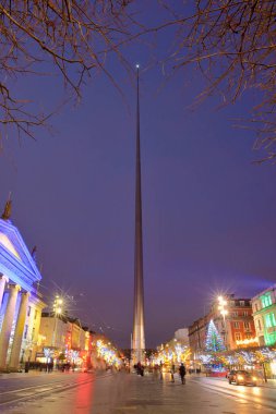 The spire monument in Dublin at Christmas time clipart