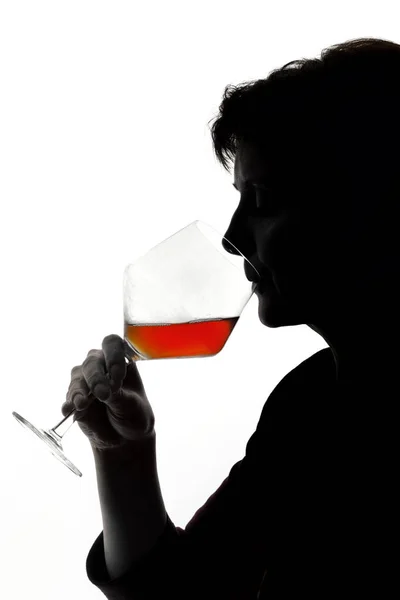Woman drinking wine Stock Picture