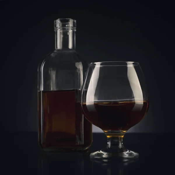 Cognac Glass Bottle Dark Studio Shot Photo — Stock Photo, Image