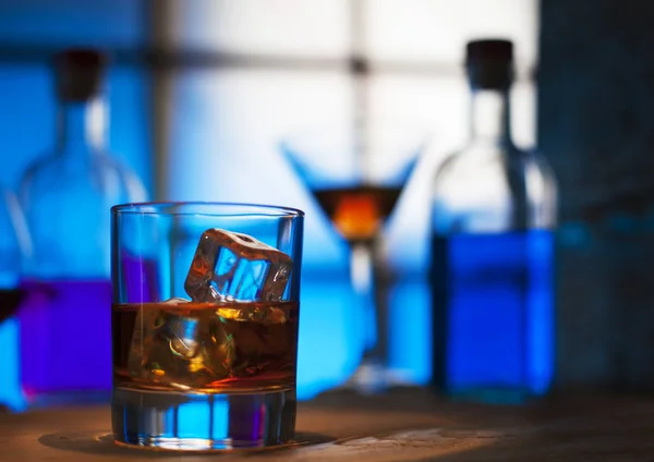 Whiskey Glass Ice Whisky Rblue Colour Background — Stock Photo, Image
