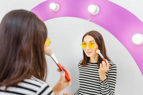 Young Woman Applying Nude Makeup Brush Mirror Indoors Cosmetic Skincare — Stock Photo, Image