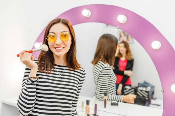 Young Woman Applying Nude Makeup Brush Mirror Indoors Cosmetic Skincare — Stock Photo, Image