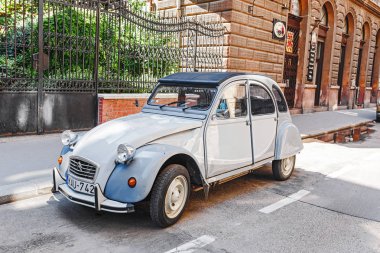 13 MAY 2018, BUDAPEST, HUNGARY: Old retro Citroen car at the city street clipart