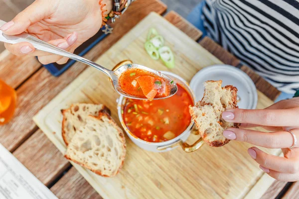 Woman Eats Traditional Hungarian Goulash Tomato Soup Saucepan Outdoor Restaurant — Stock Photo, Image