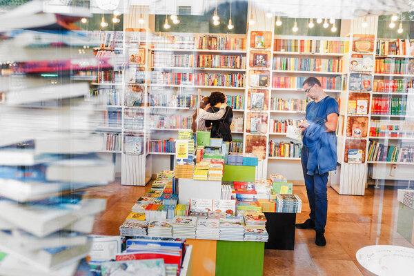 15 MAY 2018 BUDAPEST, HUNGARY: People in the booking store