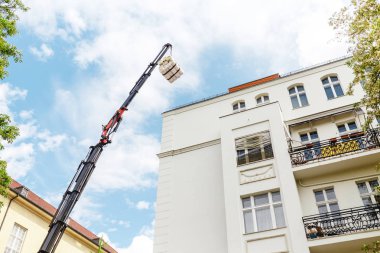 Onarım ve bina kullanarak geri yükleme cephe lifter vinç