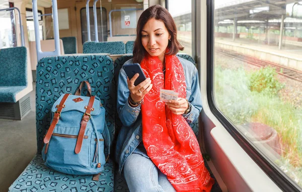 Young Happy Woman Traveling Train Sitting Window Using Smartphone — Stock Photo, Image