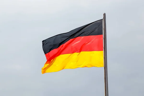 German national flag at the Bundestag Government building in Berlin