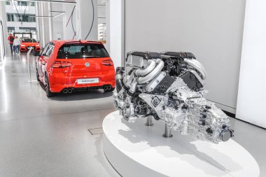 17 MAY 2018, BERLIN, GERMANY: Car Engine or motor standing in museum exhibition hall clipart